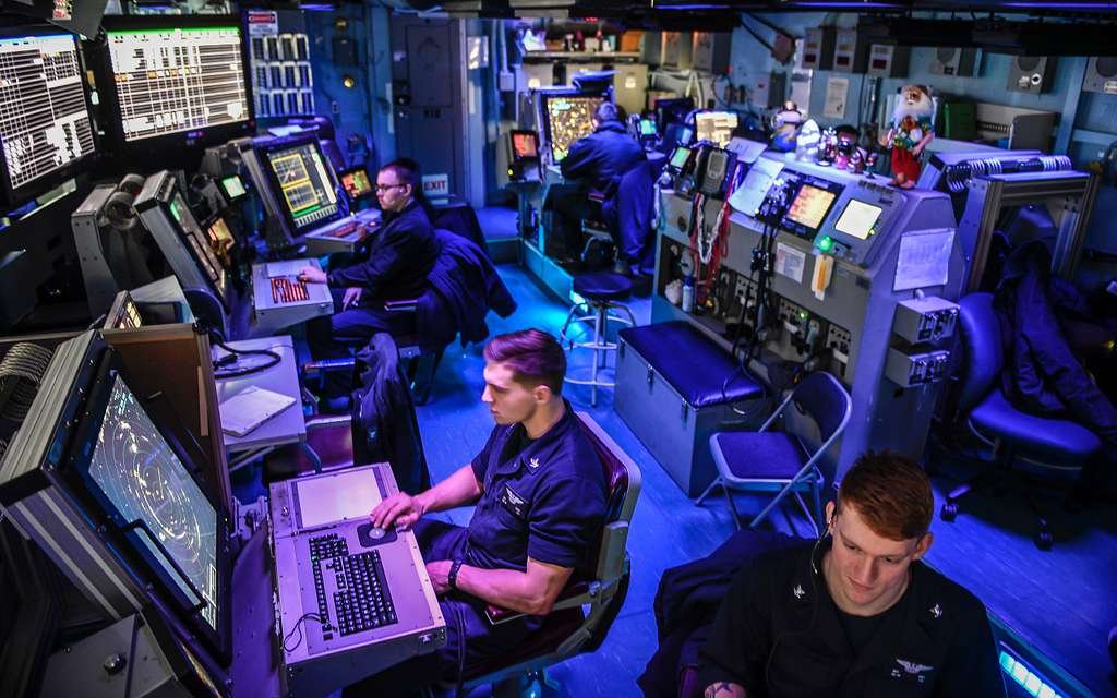 sailors in the air traffic control center aboard the nimitz class aircraft a070e1